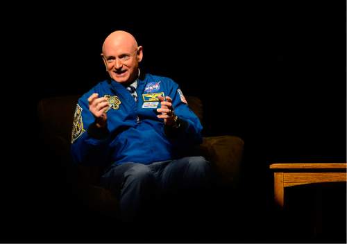Scott Sommerdorf   |  The Salt Lake Tribune
Retired astronaut and U.S. Navy Capt. Mark Kelly, describes how he spoke to his brother, astronaut Scott Kelly today trying to arrange a lease for a car for him once he returns to Earth. The lecture was presented as part of   the Natural History Museum of Utah's annual lecture series, held Wednesday, Feb. 10, at Kingsbury Hall in Salt Lake City.