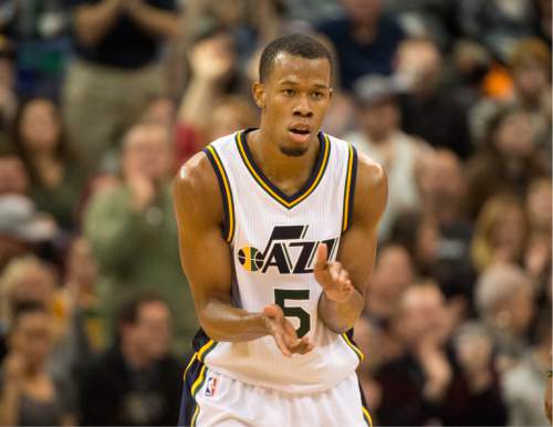 Rick Egan  |  The Salt Lake Tribune

Utah Jazz guard Rodney Hood (5) gets the team fired up as he puts the Jazz up by 4 with  5:41 left in the game, with a 3-point shot. The Jazz went on to win 92-87, in NBA action Utah Jazz vs. The Memphis Grizzlies in Salt Lake City, Saturday, January 2, 2016. Hood finished with 32 points.