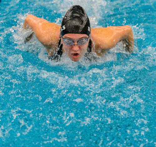Trent Nelson  |  The Salt Lake Tribune
Grand's Alexa Pierce sets a new state record in the Women's 100 Yard Butterfly at the Class 2A State Swimming Meet at BYU in Provo, Thursday February 11, 2016.