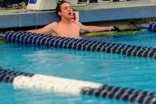 Trent Nelson  |  The Salt Lake Tribune
Telos Academy's Elliot Watt catches his breath after setting a new state record in the Men's 100 Yard Freestyle at the Class 2A State Swimming Meet at BYU in Provo, Thursday February 11, 2016.