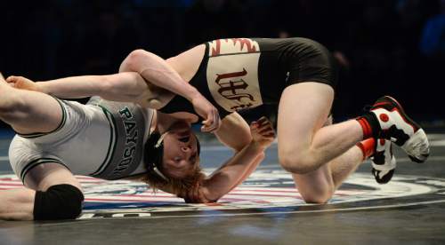Francisco Kjolseth | The Salt Lake Tribune
Taylor Lamont, right, of Maple Mountain comes out on top over Jed Loveless of Payson in the 4A 138 weight division in the wrestling state championship at Utah Valley University.