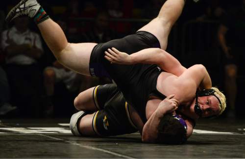 Francisco Kjolseth | The Salt Lake Tribune
Ben Bos of Wasatch, right, wins by fall over Riley Taylor of Box Elder in the 4A 285 weight division in the wrestling state championship at Utah Valley University.