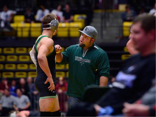 Scott Sommerdorf   |  The Salt Lake Tribune
A South Summit coach hands out some wisdom between rounds during the state wrestling tournament at UVU, Friday, February 12, 2016.