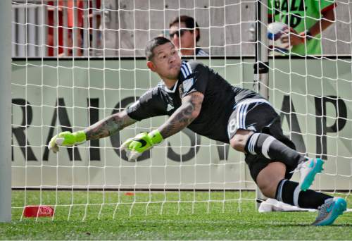 Michael Mangum  |  Special to the Tribune

Real Salt Lake goalkeeper Nick Rimando dives the wrong way during a penalty kick by Colorado Rapids midfielder during the second half of their match at Rio Tinto Stadium on Sunday, June 7, 2015. Despite Rimando diving the wrong way, Powers pushed the penalty wide and the match ended in a 0-0 draw.