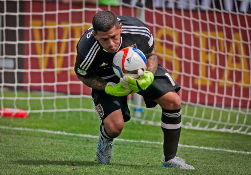 Michael Mangum  |  Special to the Tribune

Real Salt Lake goalkeeper Nick Rimando (18) makes a save against the Colorado Rapids during the first half of their match at Rio Tinto Stadium on Sunday, June 7, 2015.