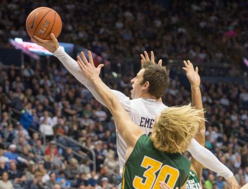 Rick Egan  |  The Salt Lake Tribune

Brigham Young Cougars guard Nick Emery (4) goes in for two points, as San Francisco Dons guard Tim Derksen (32) defends, in basketball action BYU vs. San Francisco, at the Marriott Center, Saturday, January 9, 2015.