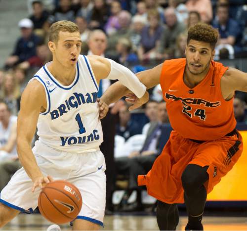 Rick Egan  |  The Salt Lake Tribune

Brigham Young Cougars guard Chase Fischer (1) takes the ball inside as Pacific Tigers forward David Taylor (24) defends,  in WCC basketball action, Brigham Young Cougars vs. The Pacific Tigers, Saturday, February 6, 2016.