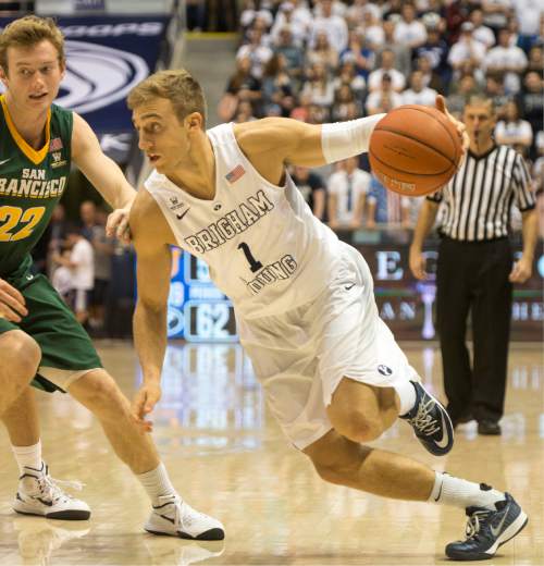 Rick Egan  |  The Salt Lake Tribune

Brigham Young Cougars guard Chase Fischer (1) takes the ball inside, as San Francisco Dons forward Chase Foster (22) defends, in basketball action BYU vs. San Francisco, at the Marriott Center, Saturday, January 9, 2015.