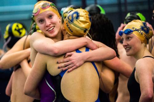 Chris Detrick  |  The Salt Lake Tribune
Skyline senior Shelby Dibble hugs teammate Aleah Griffin after winning  the 200-yard freestyle relay during the Class 4A state swimming meet at Brigham Young University Saturday February 13, 2016.