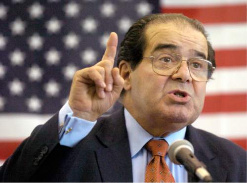 FILE - In this Wednesday, April 7, 2004 file photo, U.S. Supreme Court Justice Antonin Scalia speaks to Presbyterian Christian High School students in Hattiesburg, Miss. On Saturday, Feb. 13, 2016, the U.S. Marshall's Service confirmed that Scalia has died at the age of 79. (Gavin Averill/The Hattiesburg American via AP)
