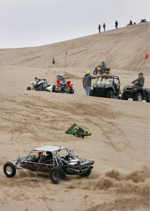 Scott Sommerdorf  |  Salt Lake Tribune
LITTLE SAHARA
Four- and two-wheel enthusiasts, dune buggies and more kick off the spring season with motorized recreation and camping at Little Sahara sand dunes. In the 2015 legislative session, Utah lawmakers dedicated more money to their fight over federally-managed public lands, including Little Sahara.