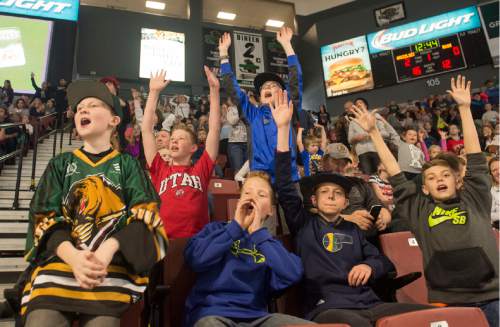 Rick Egan  |  The Salt Lake Tribune

Young hockey fans cheer at the Grizzlies gameMonday, February 15, 2016. The Grizzlies had a huge crowd today in their afternoon holiday game.