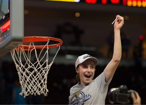 Rick Egan  |  The Salt Lake Tribune

Brigham Young Cougars guard and Tournament MVP, Lexi Eaton (21) cuts down the net, after the Cougars defeated the San Francisco Dons 76-65, in the West Coast Conference Women's Basketball Championship game, at the Orleans Arena, in Las Vegas, Tuesday, March 10, 2015