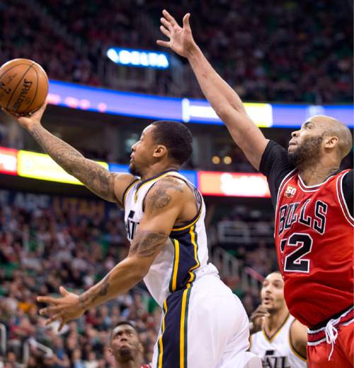 Lennie Mahler  |  The Salt Lake Tribune

Trey Burke drives past Taj Gibson in the first half of a game between the Utah Jazz and the Chicago Bulls on Monday, Feb. 1, 2016, at Vivint Smart Home Arena.