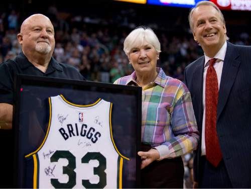 Lennie Mahler  |  The Salt Lake Tribune

Utah Jazz Head Athletic Trainer Gary Briggs is honored during a timeout by Gail Miller, owner of the LHM Group of Companies, and Jazz President Randy Rigby as the Jazz faced the Dallas Mavericks at EnergySolutions Arena on April 13, 2015. Briggs announced his retirement after 15 seasons with the Jazz and 33 total in the NBA.