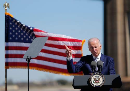 Vice President Joe Biden speaks after touring the Port of New Orleans to commemorate the seventh anniversary of the American Recovery and Reinvestment Act in New Orleans, Wednesday, Feb. 17, 2016. (AP Photo/Gerald Herbert)