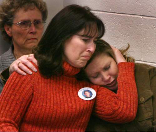 Steve Griffin  |  The Salt Lake Tribune
Debra Gette (left), mother of Christopher Ray, cries while she hugs Jennie Johnson, cousin of Ray, during a parole hearing for Brookes Colby Shumway, who, at age 15, killed his 14-year-old friend, Ray,  by stabbing him 39 times in 2000. The hearing was at the Utah State Prison in Draper on January 4, 2007.