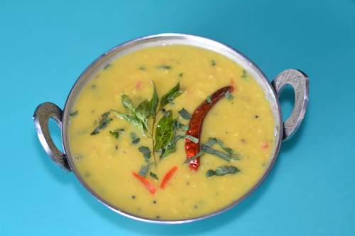 The dal tadka at Saffron Valley East India Cafe is made with split pigeon peas or  dal which are seasoned with a "tadka" of sautéed onions, tomatoes and spices. The dish can be served over steamed white rice or alongside flatbreads.

Source: Lavanya Mahate, Saffron Valley owner