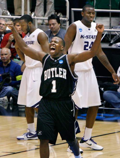 Scott Sommerdorf  |  Salt Lake Tribune
KANSAS STATE BUTLER
Butler guard Shelvin Mack (1) exults as the final seconds click off in their win over K-State. Kansas State guard Jacob Pullen (0; left), and Kansas State forward Curtis Kelly (24) are in the background. Butler beat Kansas State 63-56 to win the West regional final and go to the final four, Friday 3/27/10.