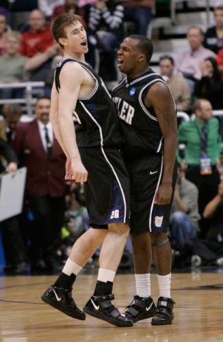 Trent Nelson | The Salt Lake Tribune

Butler's Gordon Hayward (20) and Shelvin Mack (1) bump chests as Butler faces Kansas State during the West Regional of the NCAA Tournament at EnergySolutions Arena, Saturday, March 27, 2010.