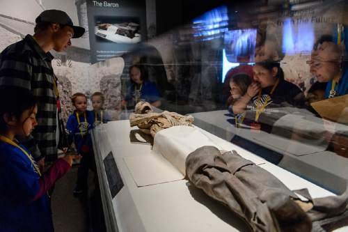 Trent Nelson  |  The Salt Lake Tribune
Kids from the Capitol West Boys & Girls Club look over the remains of Baron von Holz, who died in Germany in the early 17th century, at The Leonardo's Mummies of the World: The Exhibition in Salt Lake City, Wednesday February 17, 2016.