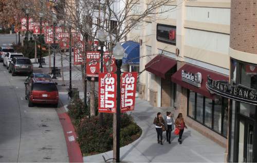 Al Hartmann  |  The Salt Lake Tribune
Shoppers check out storefronts Monday Nov. 23 at the Gateway in Salt Lake City.