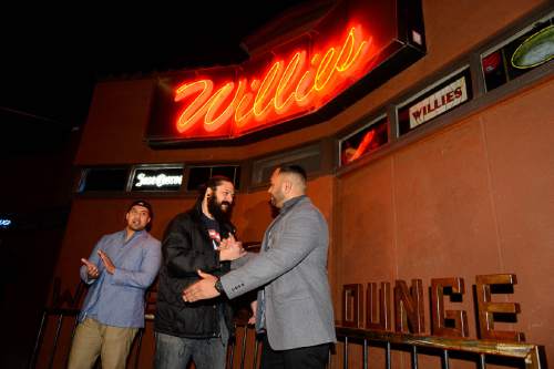 Trent Nelson  |  The Salt Lake Tribune
Mike Tuiasoa shakes hands with Frank Maea in front of Willie's Lounge in Salt Lake City, Saturday February 20, 2016, as part of a demonstration after two Polynesian men (Maea and Stephen Wily, left) were turned away earlier in the week because they looked like they could make trouble, a judgment apparently based on their ethnicity. Owner Geremy Cloyd has repeatedly apologized but ejected patron Frank Maea has said he intends to file a federal lawsuit.