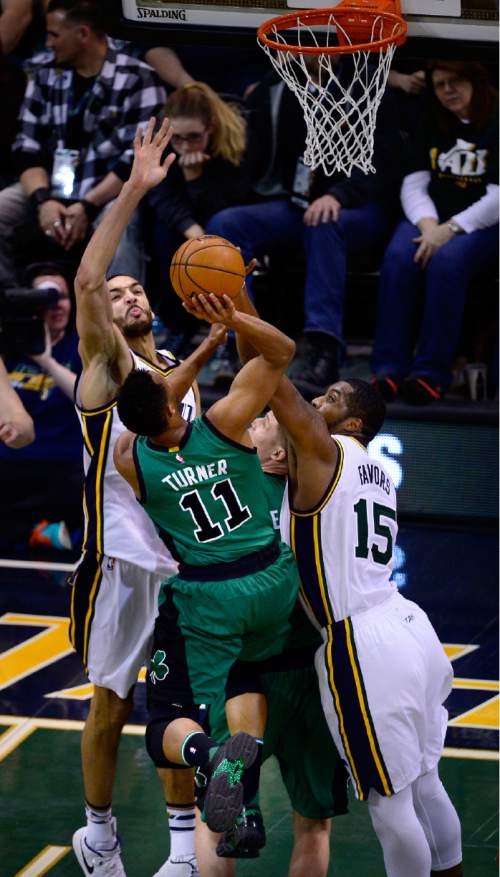Scott Sommerdorf   |  The Salt Lake Tribune
Jazz C Rudy Gobert blocks this shot by Boston's Evan Turner during second half play. The Utah Jazz beat the Boston Celtics 111-93, Friday, February 19, 2016.