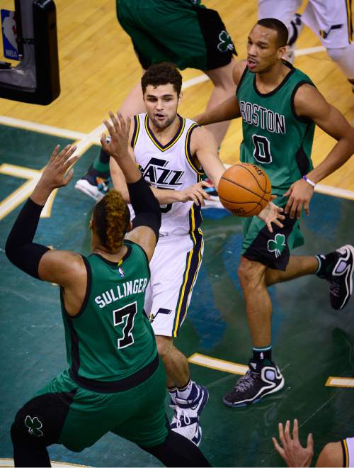 Scott Sommerdorf   |  The Salt Lake Tribune
Jazz G Raul Neto dishes off a pass under the basket during second half play. The Utah Jazz beat the Boston Celtics 111-93, Friday, February 19, 2016.