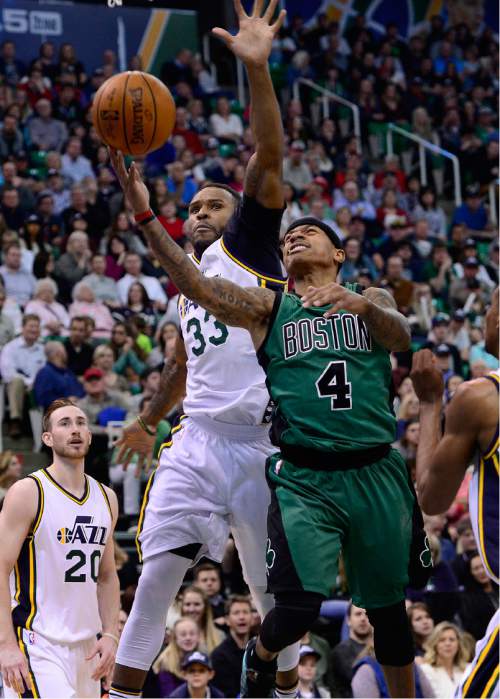 Scott Sommerdorf   |  The Salt Lake Tribune
Jazz foreword Trevor Booker defends this shot by Boston guard Isaiah Thomas during first half play. The Utah Jazz led the Boston Celtics 54-49 at the half, Friday, February 19, 2016.