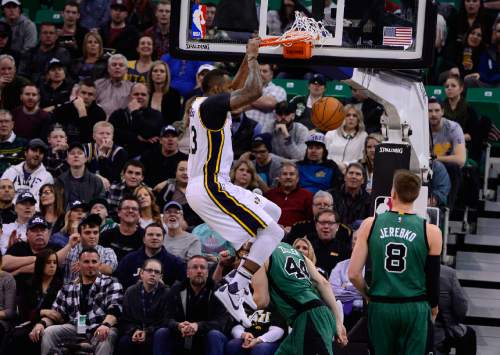 Scott Sommerdorf   |  The Salt Lake Tribune
Utah's Trevor Booker slams a dunk down during first half play that was disallowed because of an offensive foul away from the ball. The Utah Jazz led the Boston Celtics 54-49 at the half, Friday, February 19, 2016.