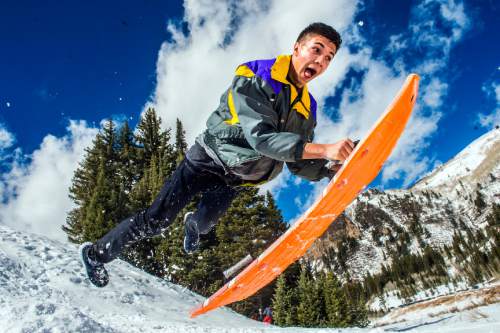 Chris Detrick  |  The Salt Lake Tribune
Camren Youlton, 17, of South Jordan, flies off of a jump while sledding near the trailhead to Donut Falls in Big Cottonwood Canyon Saturday February 20, 2016.