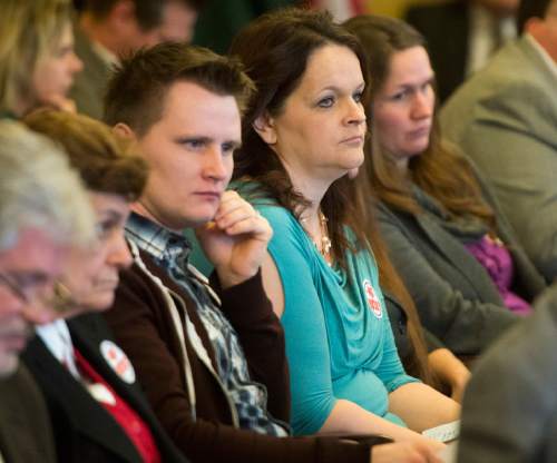 Rick Egan  |  The Salt Lake Tribune

Visitors listen to the discussion about HB281, in the House Law Enforcement and Criminal Justice Committee meeting, Friday, February 19, 2016.