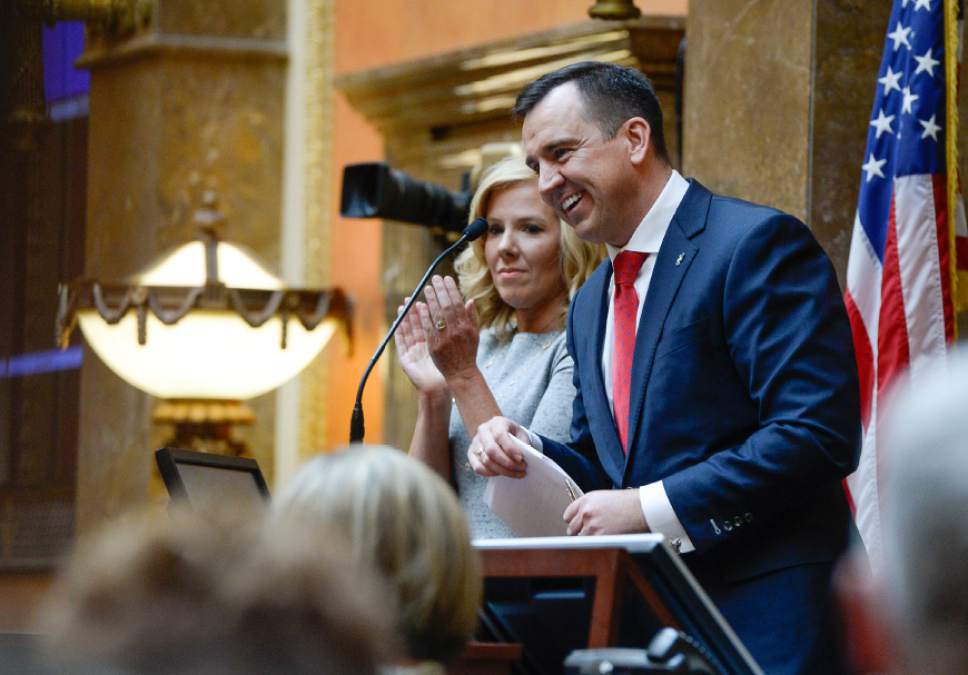 Francisco Kjolseth | The Salt Lake Tribune
Speaker of the House, Greg Hughes is joined by his wife Krista as he concluded his opening remarks for the start of the 2016 Legislative session on Monday, Jan. 25, 2016 at the Utah Capitol.