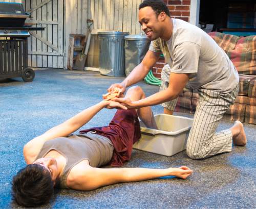 Rick Egan  |  The Salt Lake Tribune

Stefan Espinosa (left) and Carleton Bluford rehearse in Salt Lake Acting Company's  "Streetlight Woodpecker," a new play by Logan playwright Shawn Fisher.