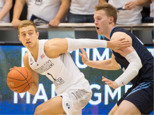 Rick Egan  |  The Salt Lake Tribune

Brigham Young Cougars guard Chase Fischer (1) looks down court after grabbing a reboud from San Diego Toreros forward Cameron Neubauer (12), in WCC basketball action, The Brigham Young Cougars vs. The San Diego Toreros, at the Marriott Center in Provo Saturday, February 20, 2016.