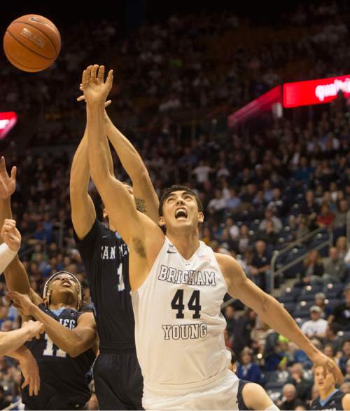 Rick Egan  |  The Salt Lake Tribune

Brigham Young Cougars center Corbin Kaufusi (44) goes for a rebound along with San Diego Toreros guard Tyler Williams (1), in WCC basketball action, The Brigham Young Cougars vs. The San Diego Toreros, at the Marriott Center in Provo Saturday, February 20, 2016.