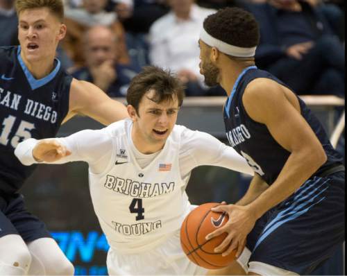 Rick Egan  |  The Salt Lake Tribune

Brigham Young Cougars guard Nick Emery (4) guards San Diego Toreros guard Olin Carter III (3),in WCC basketball action, The Brigham Young Cougars vs. The San Diego Toreros, at the Marriott Center in Provo Saturday, February 20, 2016.