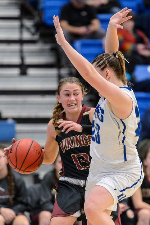 Trent Nelson  |  The Salt Lake Tribune
Viewmont's Tori Page drives on Bingham's Leya Harvey as Viewmont faces Bingham in a first round game at the 5A High School Girls Basketball Tournament at Salt Lake Community College in Taylorsville, Tuesday February 23, 2016.