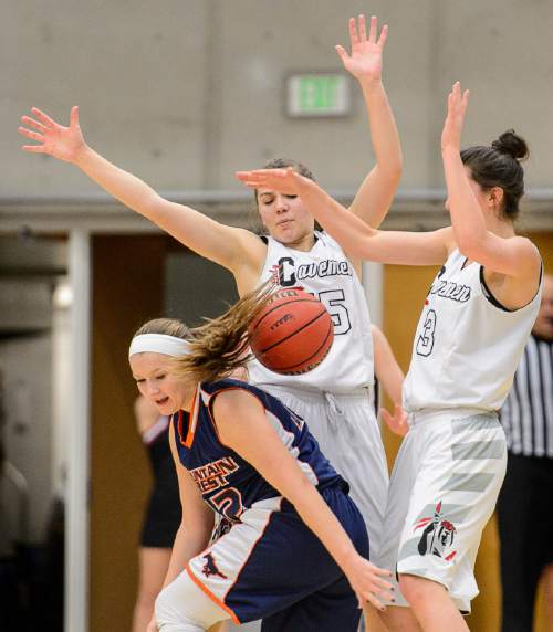 Trent Nelson  |  The Salt Lake Tribune
American Fork's Brittany Palmer and Shire Stephenson double team Mountain Crest's Brooklynn Barrus as American Fork faces Mountain Crest in a first round game at the 5A High School Girls Basketball Tournament at Salt Lake Community College in Taylorsville, Tuesday February 23, 2016.