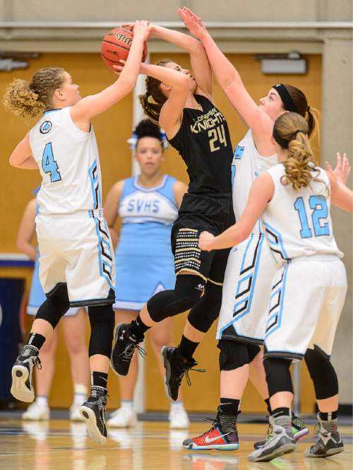 Trent Nelson  |  The Salt Lake Tribune
Sky View's Jamie Nielson blocks a shot by Lone Peak's Brooke Peterson as Sky View faces Lone Peak in a first round game at the 5A High School Girls Basketball Tournament at Salt Lake Community College in Taylorsville, Tuesday February 23, 2016.