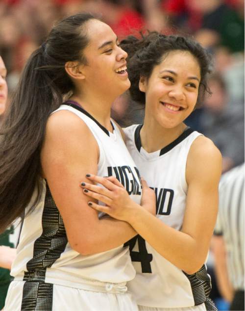 Rick Egan  |  The Salt Lake Tribune

Highland Rams center Lana Olevao (33) and Highland Rams center Lea Havili (14) celebrate as the Rams pull away from the Titans in the final seconds of the game, in State Basketball Playoff action, The Highland Rams vs. The Olympus Titans, in Taylorsville, February 22, 2016.