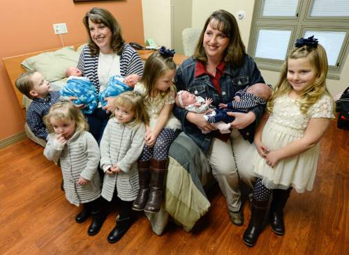 Francisco Kjolseth | The Salt Lake Tribune
Identical twin sisters Kerri Bunker, left, and Kelli Wall, became pregnant around the same time. Fast forward to the last three weeks, and they each delivered a second set of twins at Timpanogos Regional Hospital. These twin moms previously delivered their first set of twins at the same hospital within a few months of each other. Kerri's newborn twins Kash and Jace will join Hallie and Kole, 4, along with their sister Sadie, 2, second from left. As for Kelli, Kyler and Kenadee will join her previous twins of McKell and Madison, 5. The two sisters who are teachers at the same school are in the process of building a house so they can live next door to each other in Wallsburg, Utah.