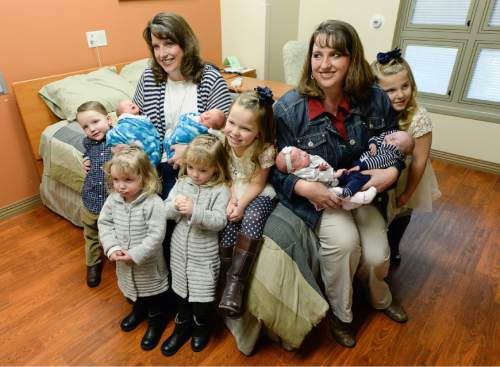 Francisco Kjolseth | The Salt Lake Tribune
Identical twin sisters Kerri Bunker, left, and Kelli Wall, became pregnant around the same time. Fast forward to the last three weeks, and they each delivered a second set of twins at Timpanogos Regional Hospital. These twin moms previously delivered their first set of twins at the same hospital within a few months of each other. Kerri's newborn twins Kash and Jace will join Hallie and Kole, 4, along with their sister Sadie, 2, second from left. As for Kelli, Kyler and Kenadee will join her previous twins of McKell and Madison, 5. The two sisters who are teachers at the same school are in the process of building a house so they can live next door to each other in Wallsburg, Utah.