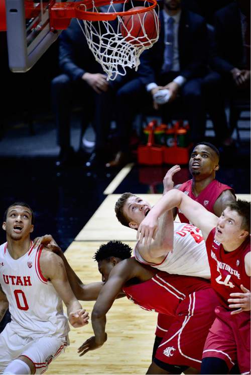 Scott Sommerdorf   |  The Salt Lake Tribune
Utah Utes forward Jakob Poeltl (42) follows the ball as it rolls in while he gets caught up in the battle for rebound positioning underneath the basket. Utah routed Washington State 88-47, Sunday, February 14, 2016.