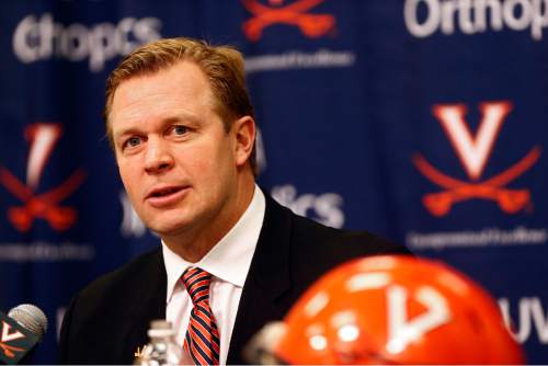 Virginia head football coach Bronco Mendenhall speaks during a press conference on national signing day on Wednesday, Feb. 3, 2016 in Charlottesville, Va. (Ryan M. Kelly/The Daily Progress via AP) MANDATORY CREDIT