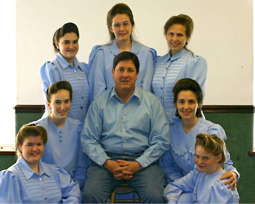 Courtesy  |  Sam Brower 

Lyle Jeffs poses for a photo with seven of his nine wives circa 2005. From left: Luella Roundy, Lenora Bauer, Mable Jessop, Dianabel Barlow, Charlene Jeffs, Pauline Barlow and Margaret Stewart. Charlene was legally married to Lyle, but divorced him in 2015.