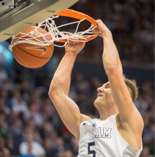 Rick Egan  |  The Salt Lake Tribune

Brigham Young guard Kyle Collinsworth (5) dunks the ball for the Coutars, in WCC basketball action, The Brigham Young Cougars vs. The San Diego Toreros, at the Marriott Center in Provo Saturday, February 20, 2016.