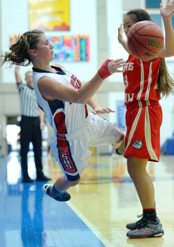 Steve Griffin  |  The Salt Lake Tribune


Springville's Olivia Park leaps into the air as she saves the ball from Judge's Grace Nakamura during the Judge Memorial Catholic High School versus Springville High School girl's 4A quarter final game at Salt Lake Community College in Salt Lake City, Wednesday, February 24, 2016.