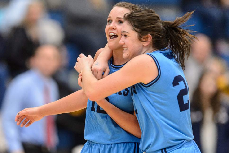 Trent Nelson  |  The Salt Lake Tribune
Salem Hills's Lauren Gustin (12) and Salem Hills's JaneAshley Nelson (24) celebrate the win as Skyline faces Salem Hills in a quarterfinals game at the 4A High School Girls Basketball Tournament at Salt Lake Community College in Taylorsville, Wednesday February 24, 2016.